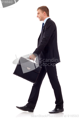 Image of walking man holding brief