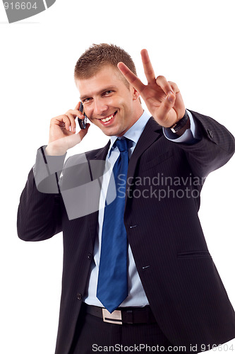 Image of man making victory sign
