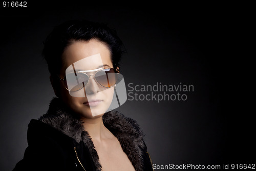 Image of  beautiful woman in fur