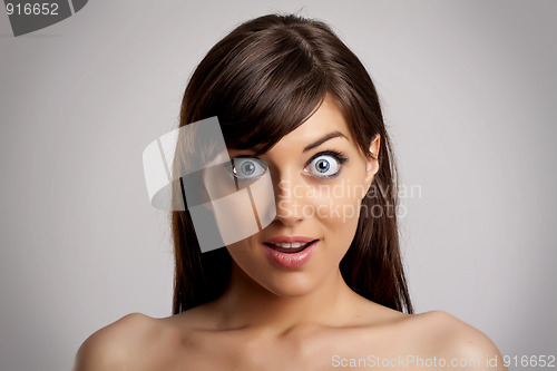 Image of surprised young woman
