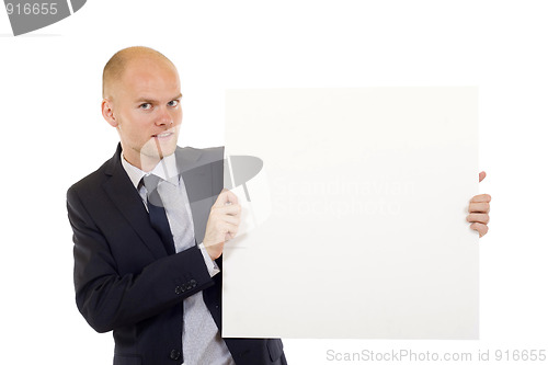 Image of man holding a white board