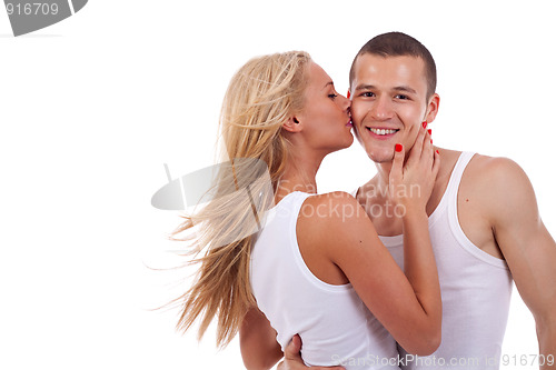 Image of woman kissing man