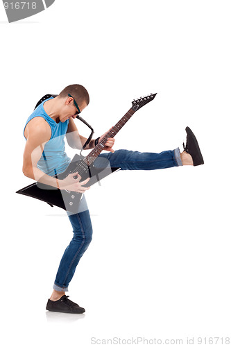 Image of  kicking guitarist