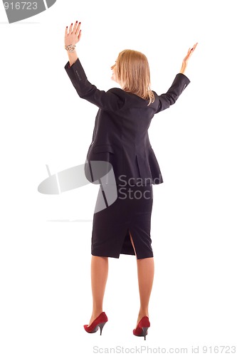 Image of woman with arms raised