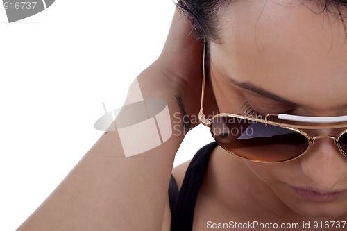 Image of girl wears sunglasses. 