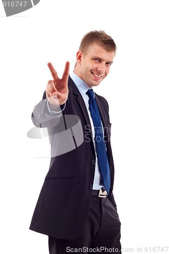 Image of business man gesturing victory