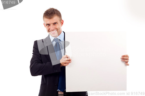 Image of  man showing a blank board