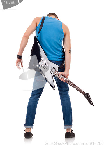 Image of back of a guitarist