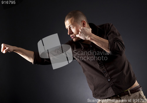 Image of a man in fight action