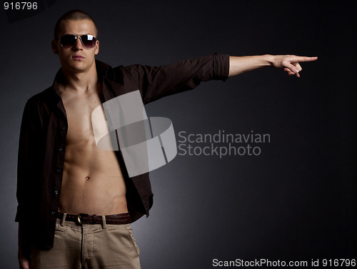 Image of Man pointing sideways 