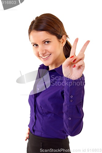 Image of woman making victory sign