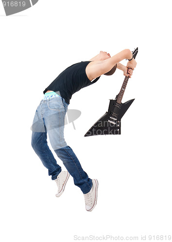 Image of guitarist breaking his guitar