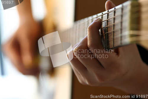 Image of Playing guitar