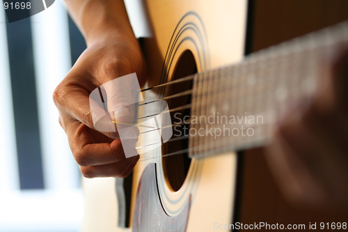 Image of Playing guitar