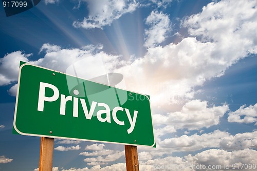 Image of Privacy Green Road Sign Over Clouds