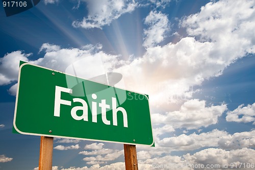 Image of Faith Green Road Sign Over Clouds