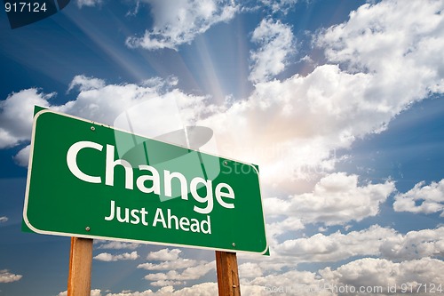 Image of Change Green Road Sign Over Clouds