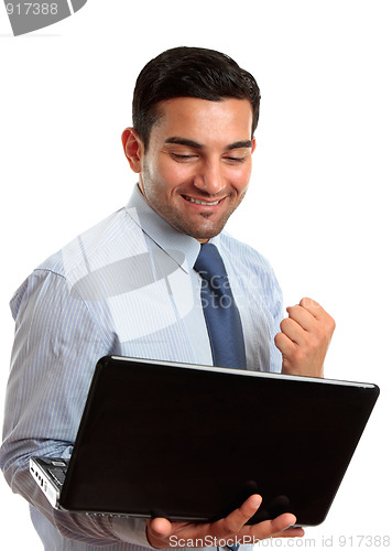 Image of Business man with laptop computer success, victory