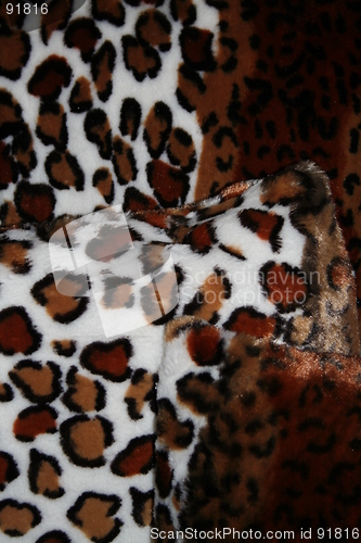 Image of White and brown cushions