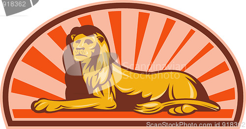 Image of Lion sitting with sunburst