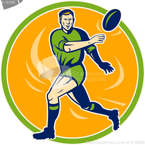 Image of Rugby player running and passing ball