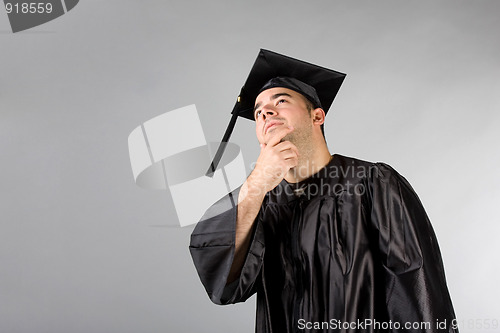 Image of Graduate Holding Dog