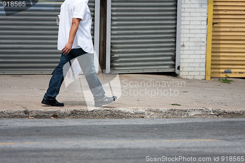 Image of Man Walking Along