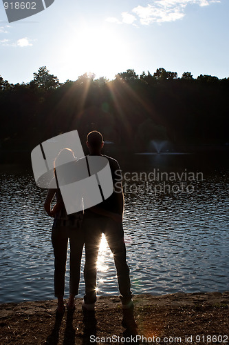 Image of Back Lit Couple Silhouette