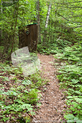 Image of Old Outhouse in the Woods