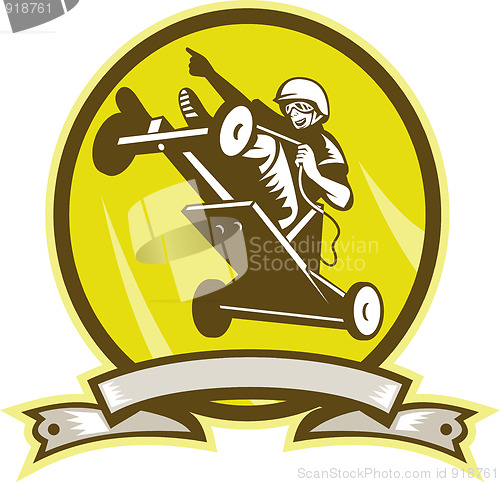 Image of Soap box derby car jumping 