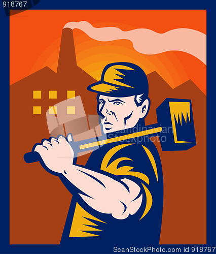 Image of factory worker with sledgehammer