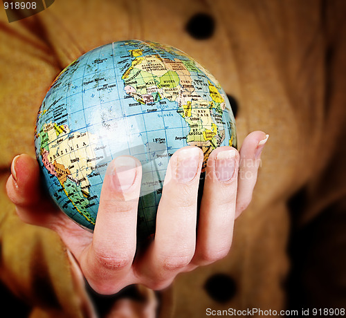 Image of Globe in a girl's hands