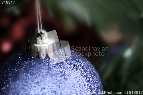 Image of Christmas ornaments on tree.