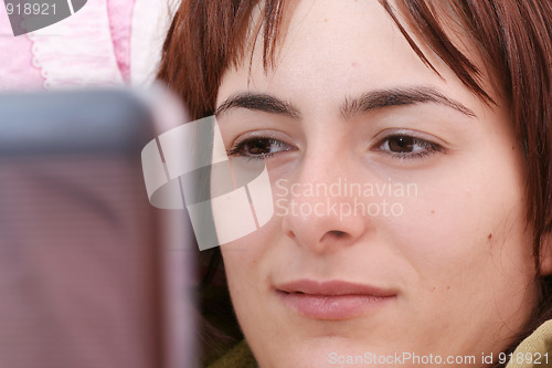 Image of Young woman with laptop 