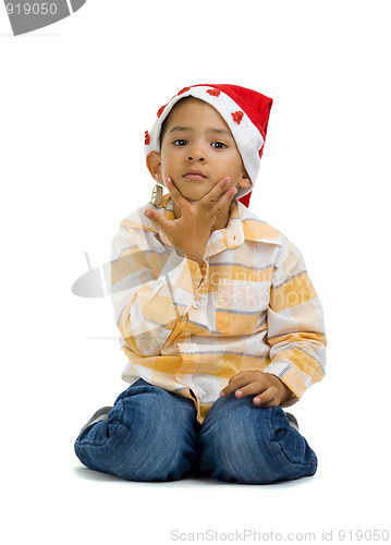 Image of  boy with santa claus hat