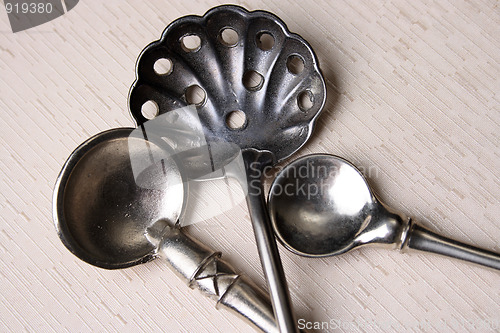 Image of Silver Spoons on Cream