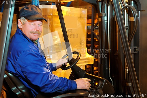 Image of forklift loader worker at warehouse