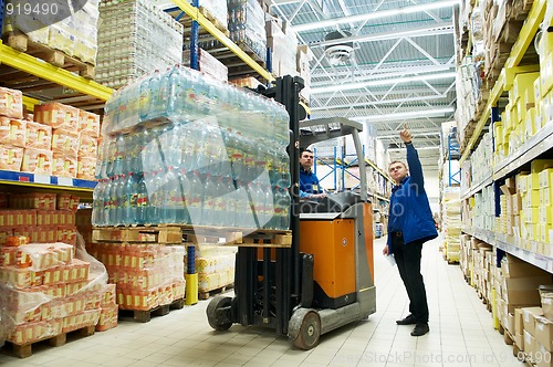 Image of distribution in warehouse with forklift