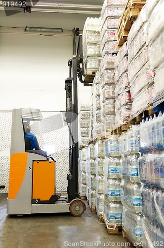 Image of warehousing truck at work