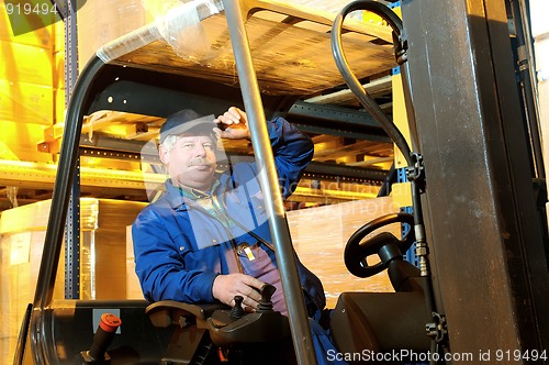 Image of forklift loader worker at warehouse