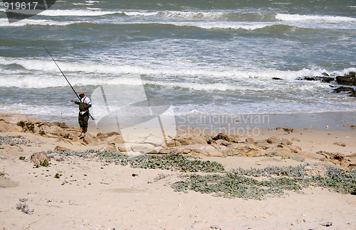 Image of Fisherman on the rocks