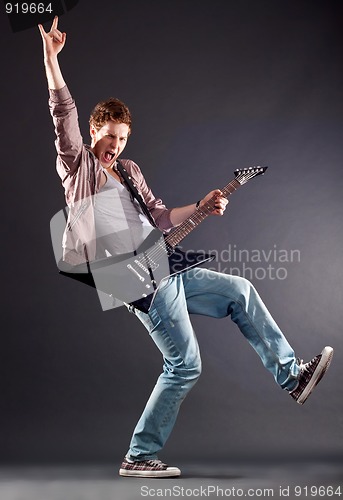 Image of handsome guitarist