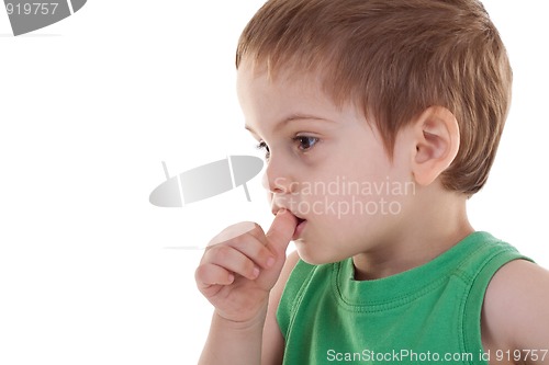 Image of kid with finger in his mouth