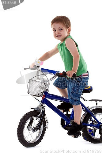 Image of  boy riding a  bike 