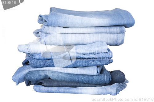 Image of stack of blue denim jeans