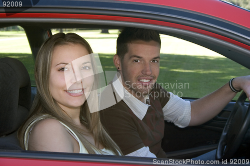 Image of Driving Couple