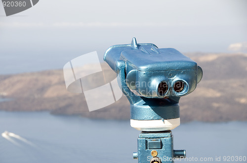 Image of viewing telescope binocular station over santorini greek island