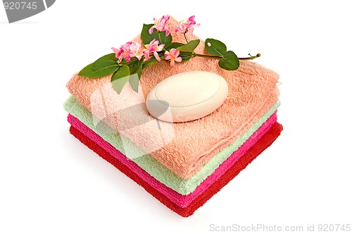 Image of A pile of towels and soap