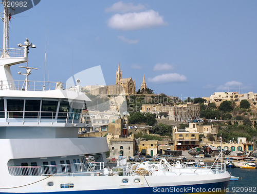 Image of Ferry boat near of Gozo coastline