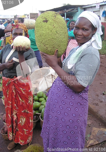 Image of market vendor and breadfruit